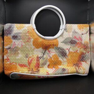 Vintage Maurizio Taiuti tote with floral design on woven leather